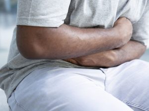 person with stomach pain