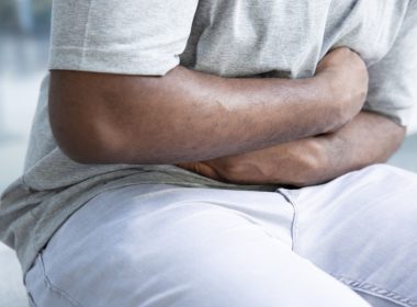 person with stomach pain