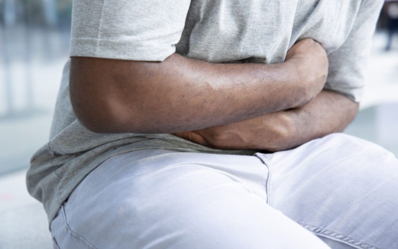 person with stomach pain