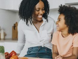 Mother and child talking in the kitchen